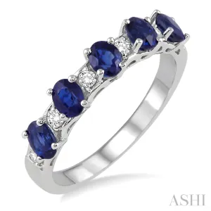 14KW 0.15 CTW Diamond Oval Sapphire and Round Cut Diamond Ring